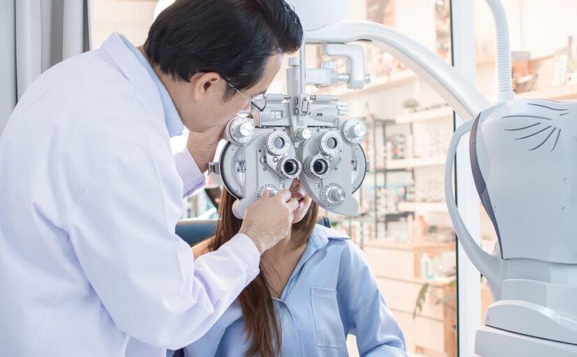 Optometrist checking a patients vision